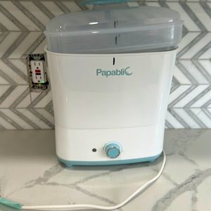 Baby bottle sterilizer- Papablic. Wonderful sterilizer. Good con.